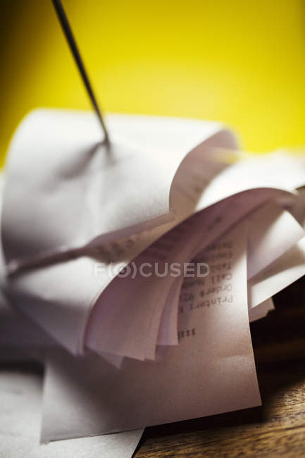 Check spindle with receipts — Stock Photo