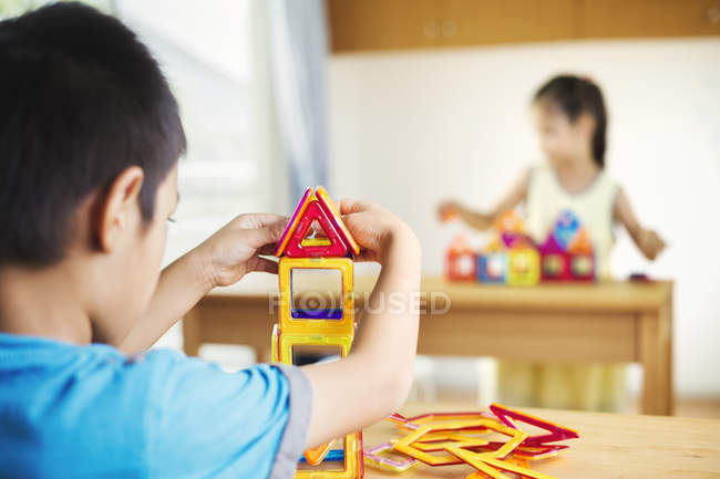 Two children building — Stock Photo