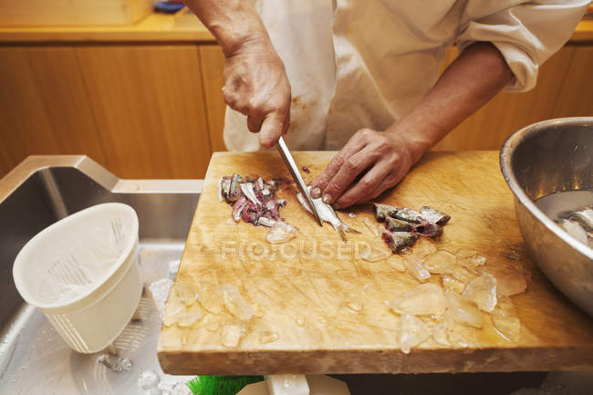 Chef working in a small commercial kitchen — Stock Photo