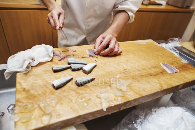 Chef working in a small commercial kitchen — Stock Photo