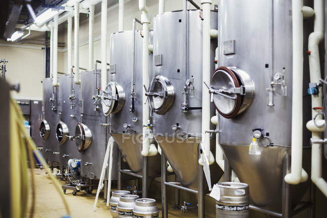 Metal beer tanks in a brewery. — Stock Photo