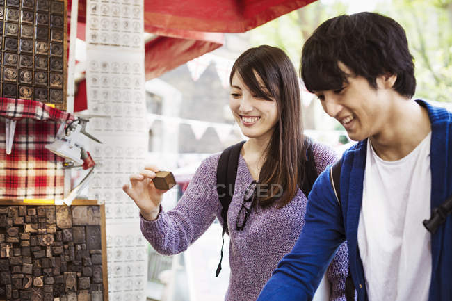 Two Japanese tourist shopping — Stock Photo