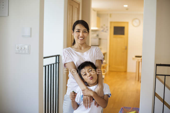 Woman and a young boy at home. — Stock Photo