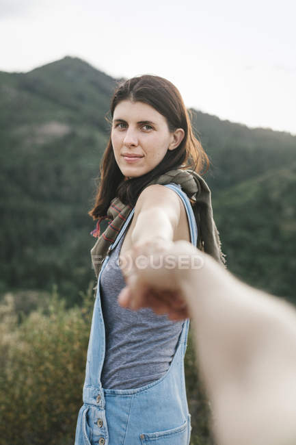 Woman holding hand of man — Stock Photo