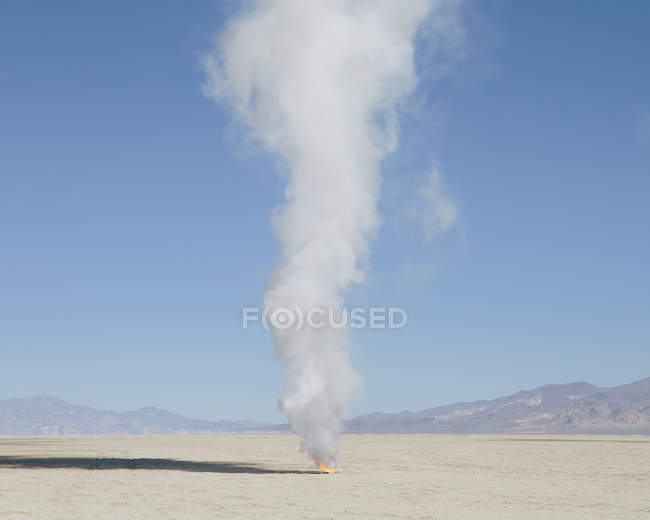 Smoke and flames from destroyed rocket — Stock Photo