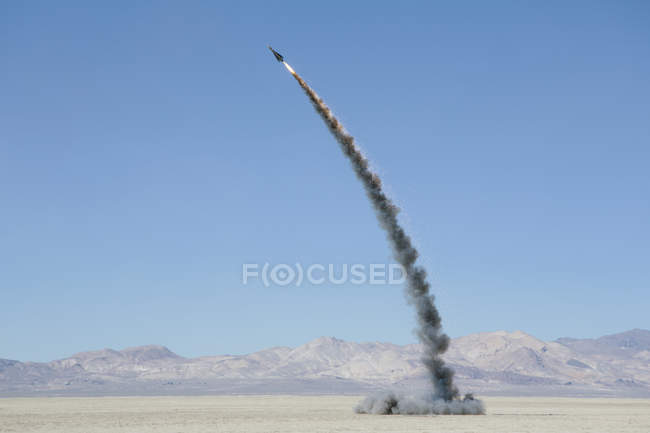 Rocket shooting into vast — Stock Photo