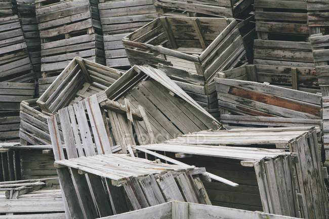 Pile of old wooden fruit crates — Stock Photo