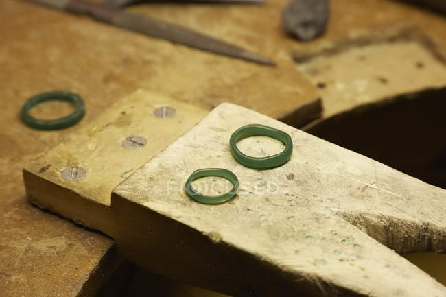 Workbench with three rings prototypes — Stock Photo