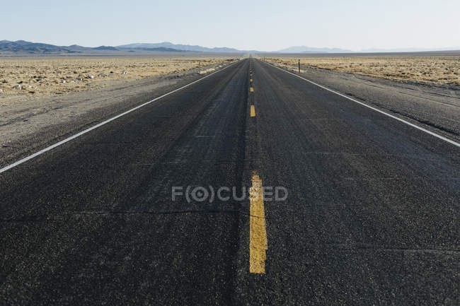 Remote rural two lane road — Stock Photo