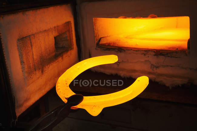 Red glowing horseshoe shape — Stock Photo