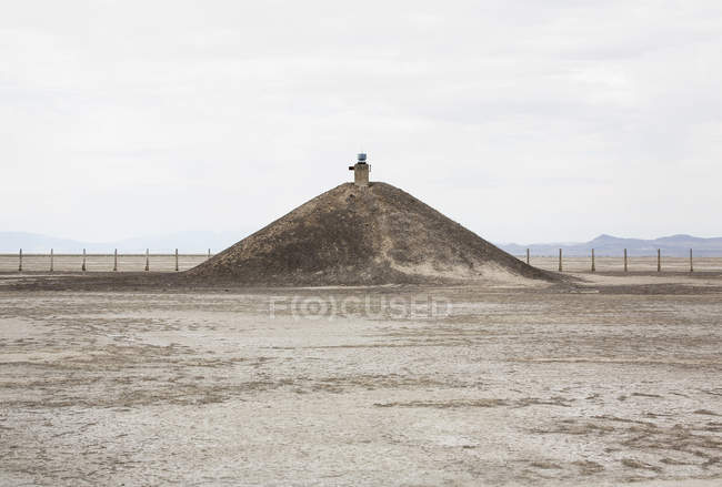 Mound in flat landscape — Stock Photo