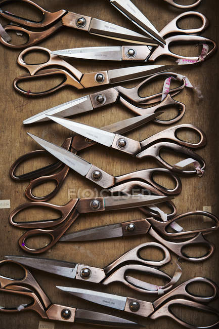 Row of used and worn scissors — Stock Photo