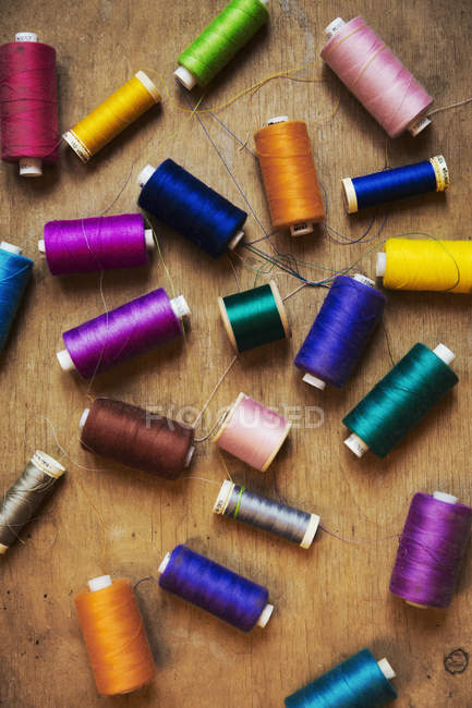 Collection of embroidery silks on tabletop — Stock Photo