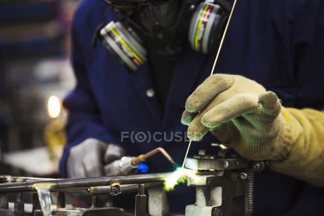 Skilled factory worker — Stock Photo