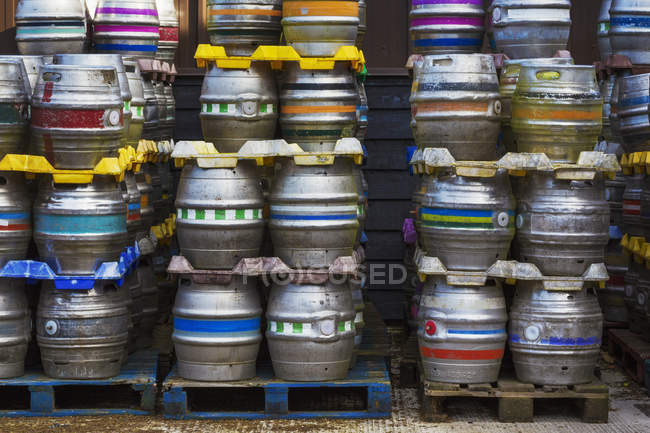 Stacks of metal beer kegs — Stock Photo