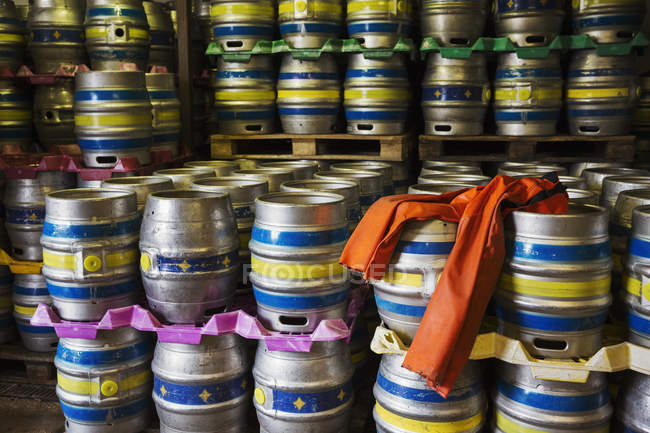 Stacks of metal beer kegs — Stock Photo
