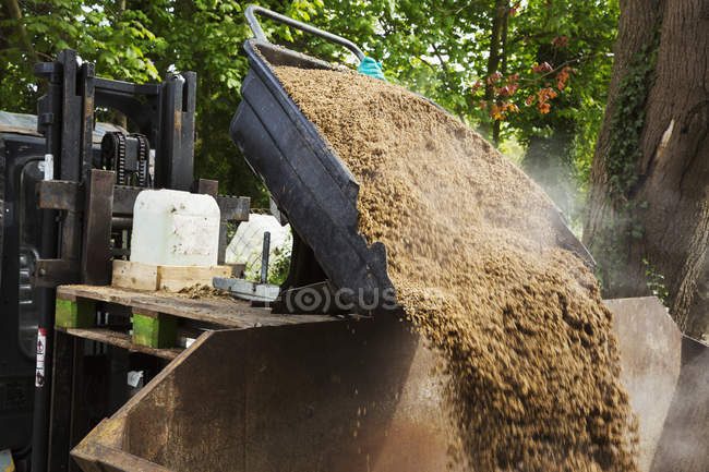 Steaming spent grain — Stock Photo