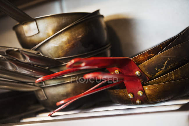 Stacks of pots and pans — Stock Photo