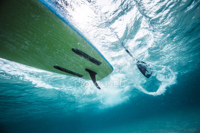 Paddleboard taken underwater. — Stock Photo