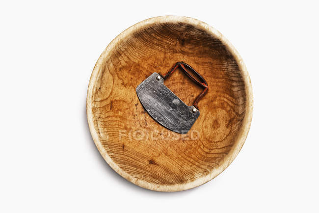 Well worn wooden chopping bowl with steel blade and handle. — Stock Photo