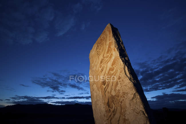 Deer stone marker with marks and inscriptions in Mongolia — Stock Photo