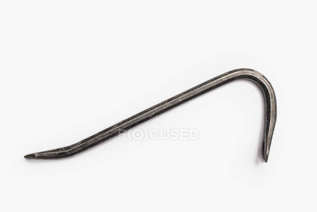 Well used levering crowbar tool on white background. — Stock Photo