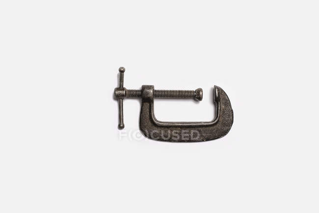 Well used adjustable clamp on white background. — Stock Photo