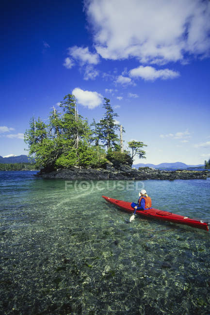 Man in sea kayak on calm water off shore of Ketchikan, Alaska, USA. — Stock Photo