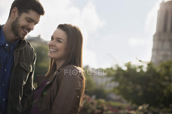 Mid adult couple standing close together in historic city. — Stock Photo