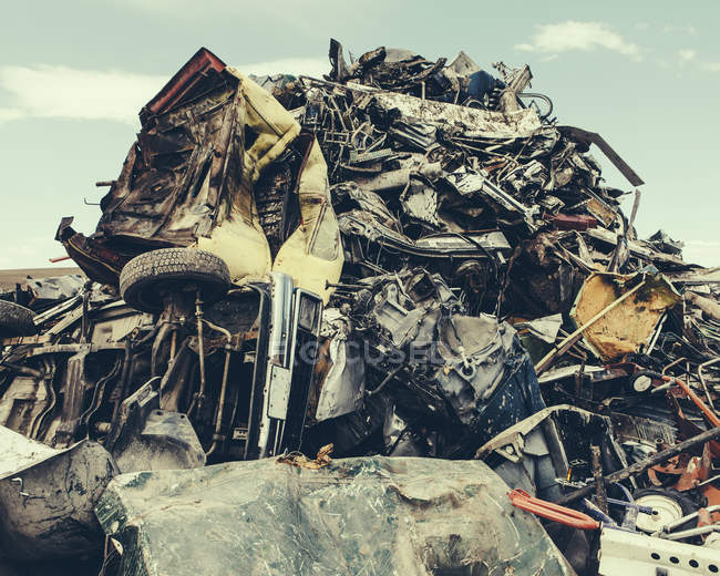 Heap of crushed scrap metal and old cars. — Stock Photo