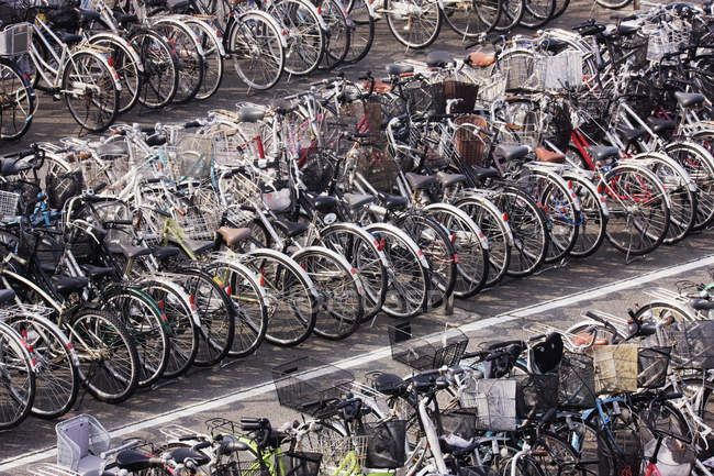 Rows of parked bicycles in Kurashiki, Japan — Stock Photo