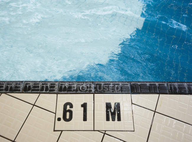 Shallow end of public swimming pool, close-up — Stock Photo