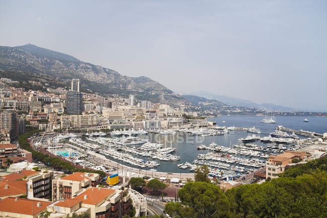 Moored ships and boats in harbor of Monaco — Stock Photo
