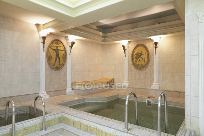 Spa room with swimming pool in health club — Stock Photo