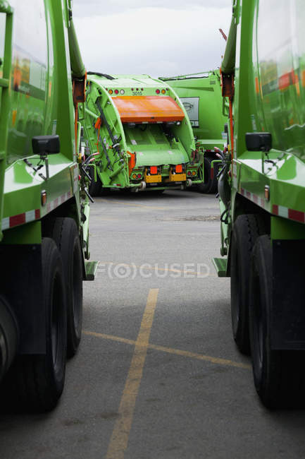 Garbage trucks fleet in parking lot in Seattle, USA — Stock Photo