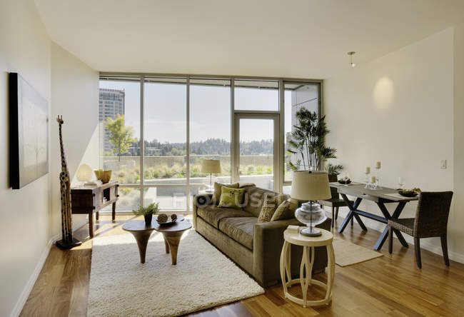 Living room in luxury highrise apartment — Stock Photo