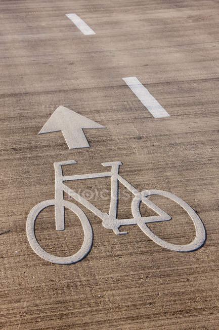 Bicycle lane direction on road, close-up — Stock Photo