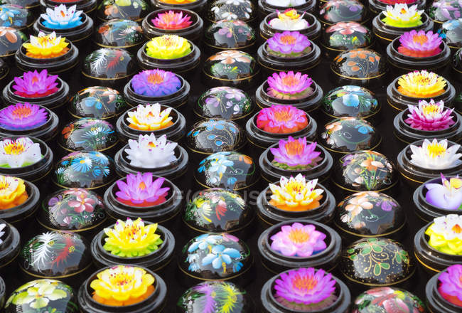 Carved soap lotus flowers in bowls, full frame — Stock Photo
