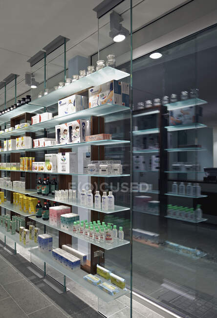 Glass shelves and windos in modern pharmacy — Stock Photo