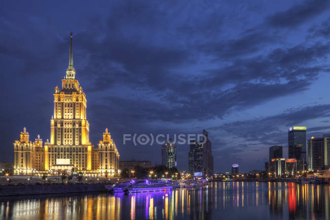 City skyline illuminated at night, Moscow, Russia — Stock Photo