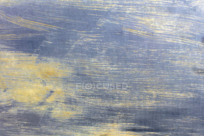 Close-up of grey metallic paint with scratches on metal. — Stock Photo