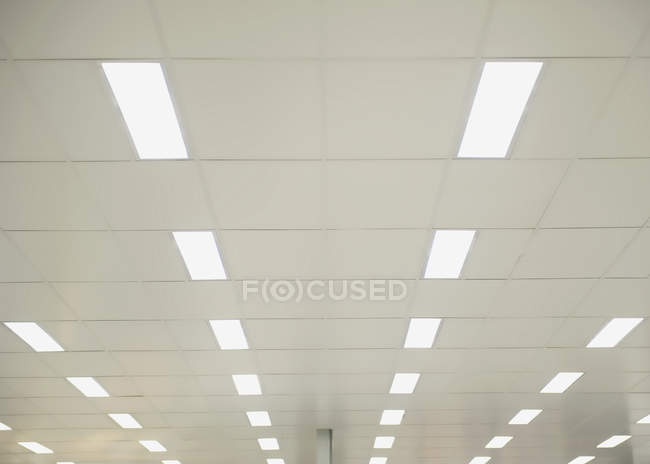 Suspended ceiling lights in building in Melbourne, Victoria, Australia — Stock Photo