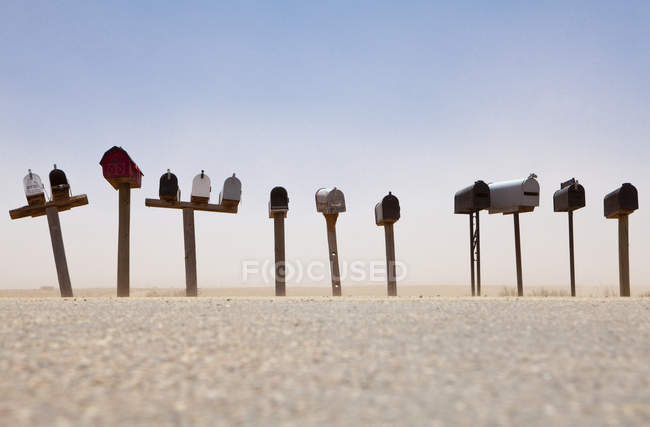 Rows of mailboxes and desert dust, Arizona, USA — Stock Photo