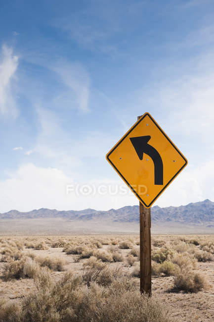 Road sign in desert of Death Valley, California, USA — Stock Photo