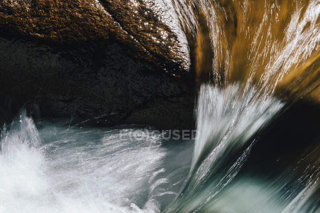 Close-up long exposure of flowing river water — Stock Photo