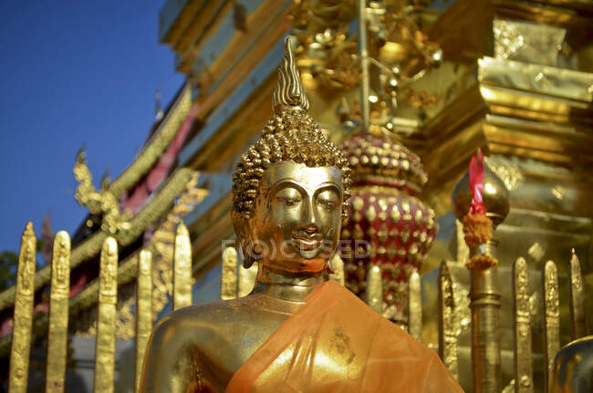 Close up of golden Buddha statue outside temple, Myanmar. — Stock Photo