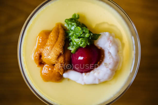 High angle close-up of uni chawanmushi with chilled egg custard. — Stock Photo