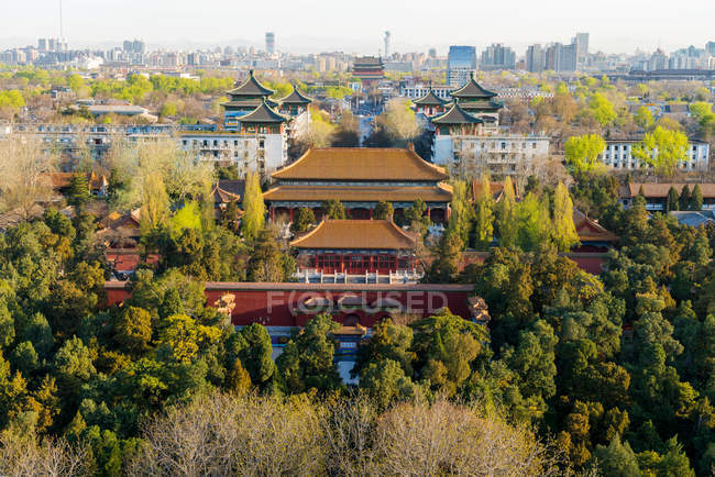 Elevated view over palace of Forbidden City in cityscape of Beijing, China — Stock Photo