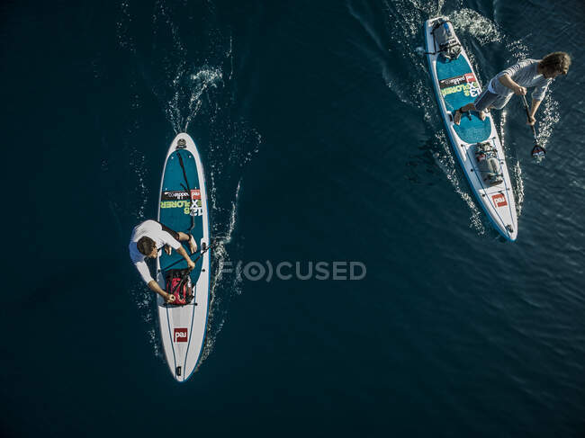 Aerial shot of two people on paddleboards. — Stock Photo