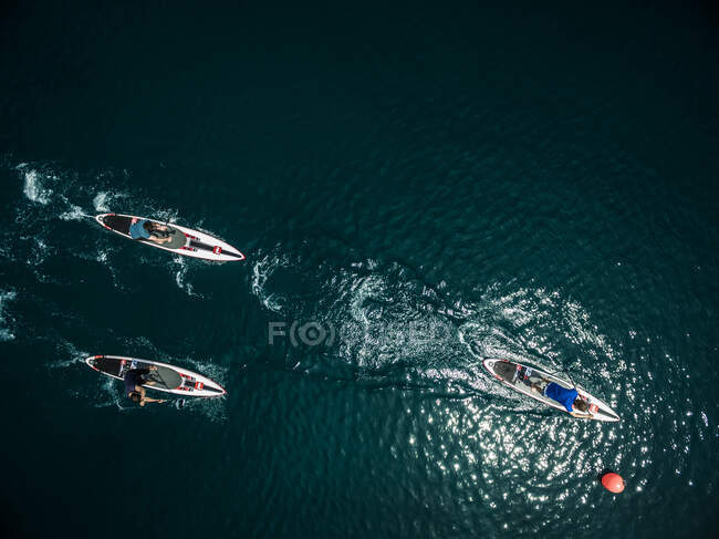 Aerial shot of a group of people on paddleboards. — Stock Photo